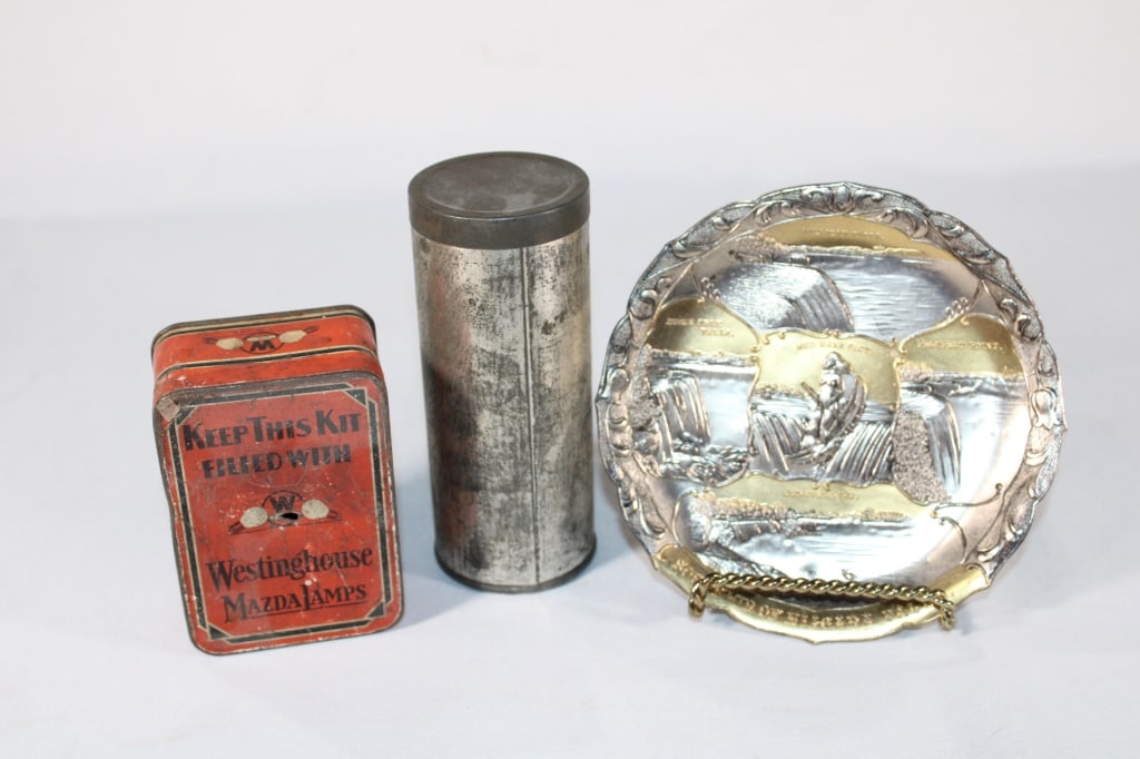 Vintage Niagra Falls Souvenir Ashtray & More: Westinghouse Mazda Lamps tin and another cylindrical tin missing label. Good overall as pictured.