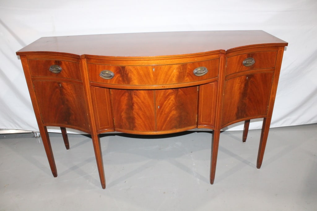 Tall Wood Serpentine Sideboard w/key: measures about 67 inches wide by 26 inches deep by 39 inches tall