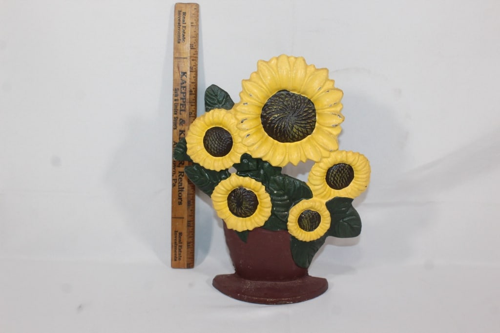 Antique cast iron sunflower door stop: Good overall as pictured
