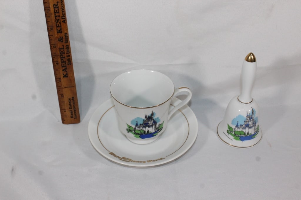 Walt Disney World collectors tea cup and bell: good overall as pictured