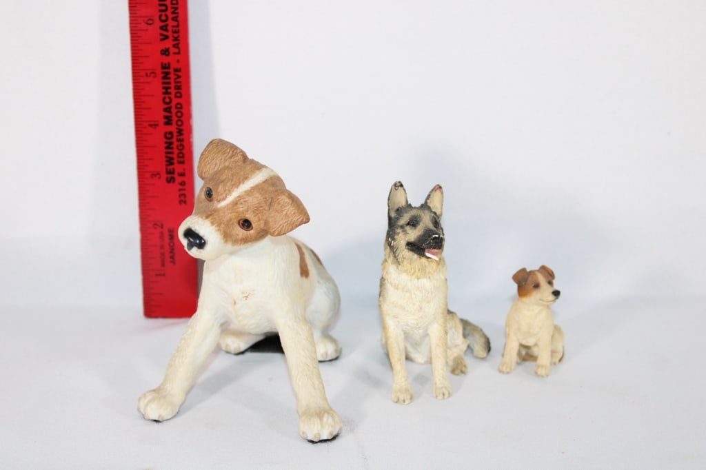 Three Ceramic dog statues (1 of 4)