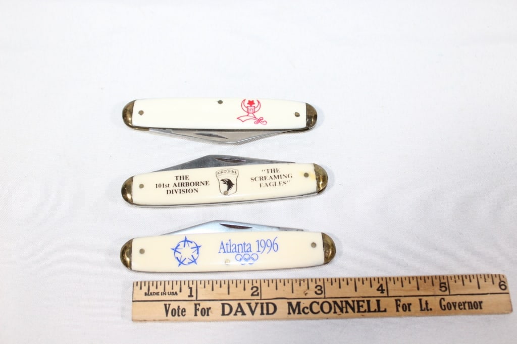 Vintage 3 Bone Inlay Bear Hunter Pocket Knife: Set of 3 bone inlay pocket knife - Atlanta Olympics 1996, The 101st Airborne Division & a symbolic mark. Good overall as pictured.