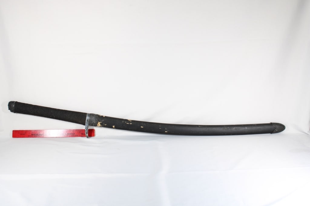 Japanese Kitana & Sheath w/ Braided Rope Grip: Metal Chape, Locket & Skull On Pommel Overall Length - 41" Blade Length - 27" Good overall as pictured