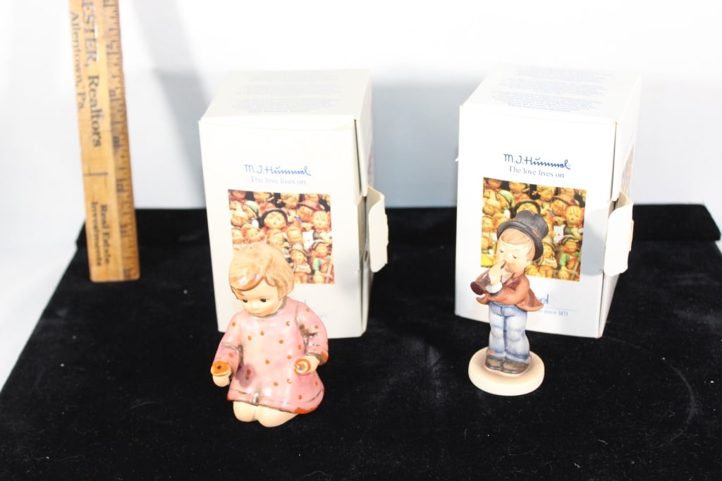 Tqo M.J. Hummel Goebel figurines with boxes (1 of 3)