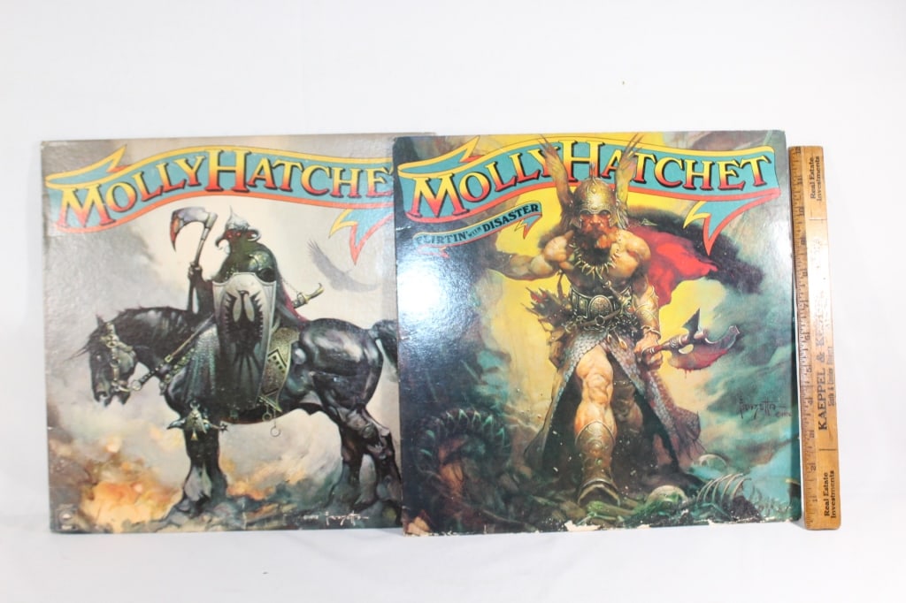Two Molly Hatchet records/Albums: Flirtin with Disaster, Good overall as pictured