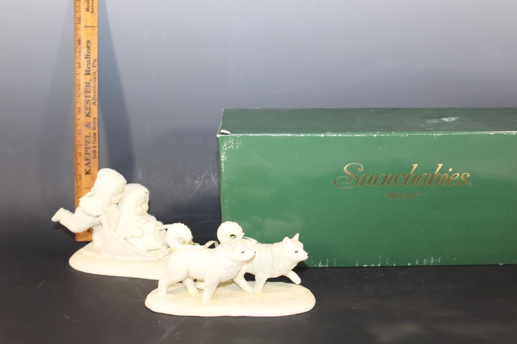 Snowbabies "Mush!" porcelian figurine: Snowbabies roughly 4 inches tall Good overall as pictured *Proceeds from this lot benefit the Rotary Club of Greater Gainesville (Fla.)