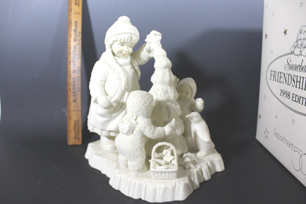 Snowbabies Together we can make the season bright: Department 56 Together we can make the season bright Good overall condition as pictured Roughly 8" tall *Proceeds from this lot benefit the Rotary Club of