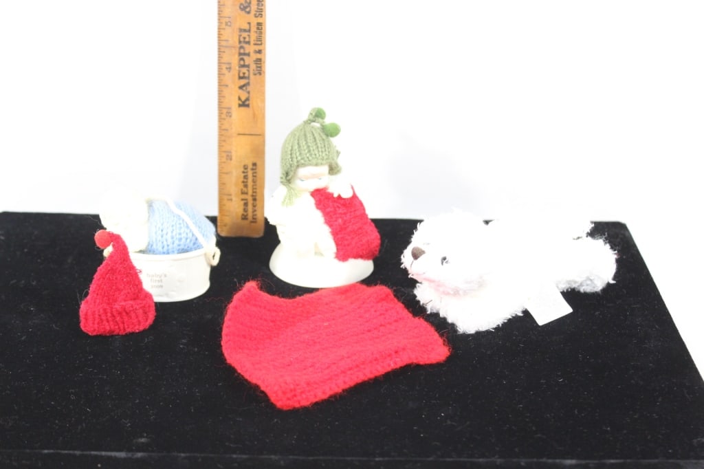 Two Snowbabies figurines,Snowbabie plush bear: Babies first 2009 ornament-Snuggle with me roughly 3 inches tall Good overall as pictured *Proceeds from this lot benefit the Rotary Club of Greater Gainesville (Fla.)
