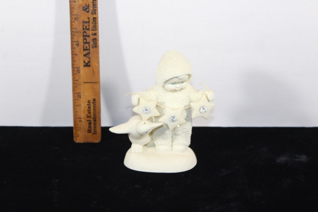 Snowbabies 45th trienium 2006 figurine: roughly 4.5 inches tall Good overall as pictured *Proceeds from this lot benefit the Rotary Club of Greater Gainesville (Fla.)