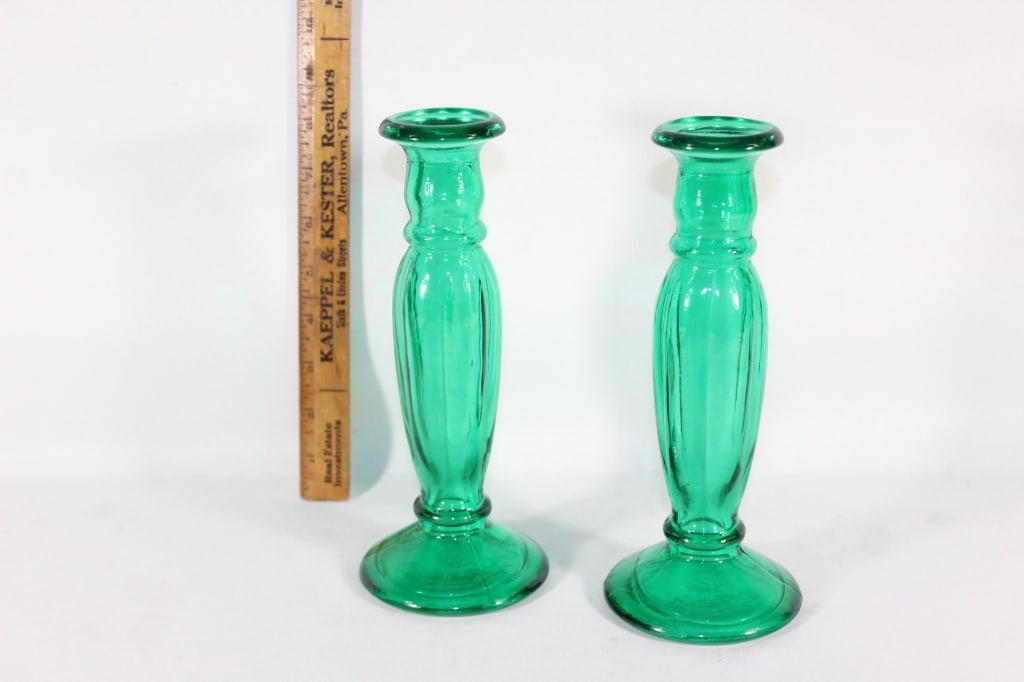 Decoravtive green glass candlesticks: Roughly 8 inches tall Good overall as pictured
