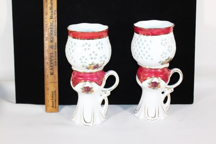 Two VTG ceramic floral oil lamps