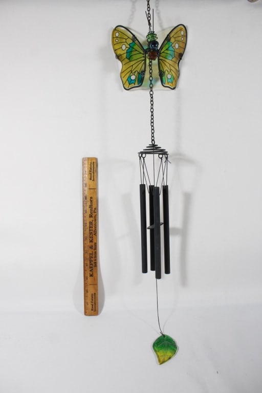 Butterfly wind chime: very ornate butterfly wind chime with yellow glass type wings *Proceeds from this lot benefit the Rotary Club of Greater Gainesville (Fla.)