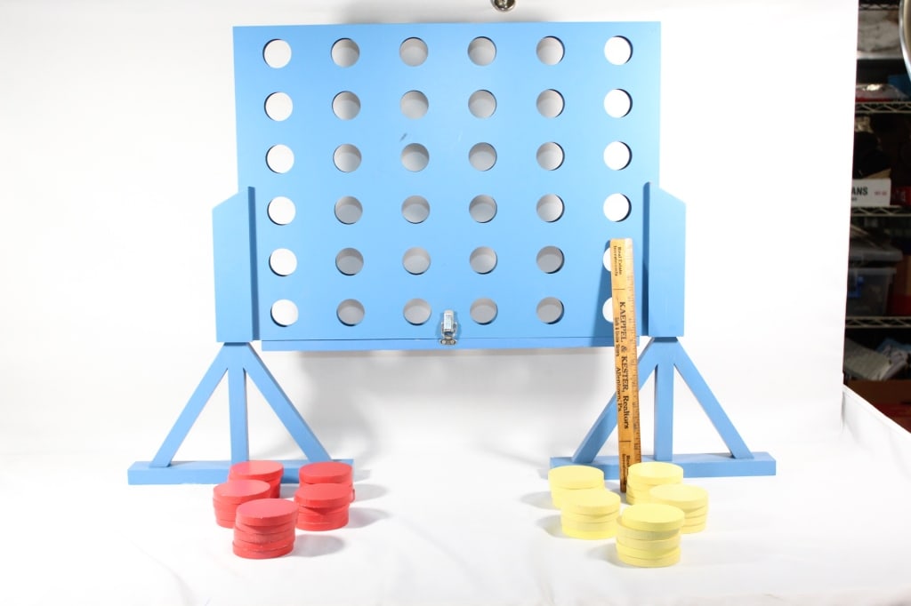 Connect Four Game With Discs: 25 white discs; 26 red discs. 22 inches tall and 32 inches wide. Great shape.
