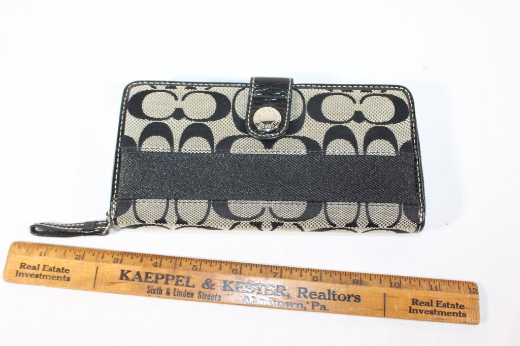 Black large Coach wallet: Good overall as pictured