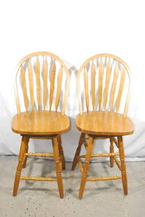 Pair of Oak Swivel Bar Stools: measures to seat - 24 inches - to top of back - 42 inches to top