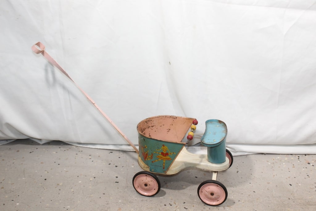 Antique Metal Doll Push Toy (1 of 4)