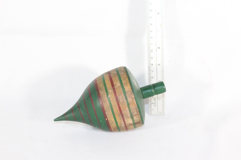 19th Century Painted wooden spinning top toy: Roughly measures 7 inches long Good overall as pictured