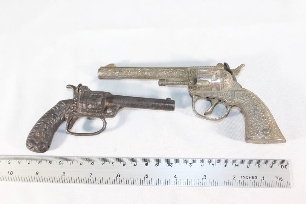 Pair of Vintage Metal Toy Cap Guns: one hammer is loose
