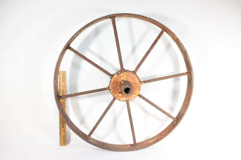 Antique metal wagon wheel (1 of 2)