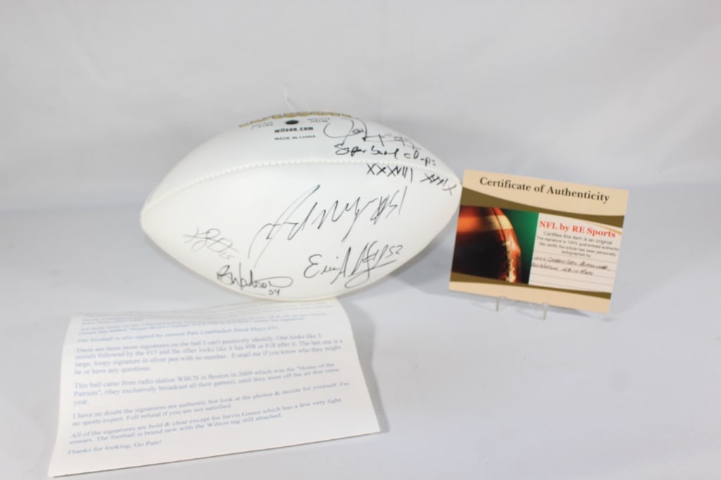New England Patriots 7 Team Member Signed Football: signed by: Jarvis Green, Eric Alexander, Ben Watson, Jerod Mayo and 3 other unidentified Signatures; with pictured COA and provenance as pictured
