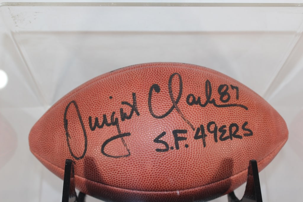 Dwight Clark Autographed Football and Case (1 of 2)