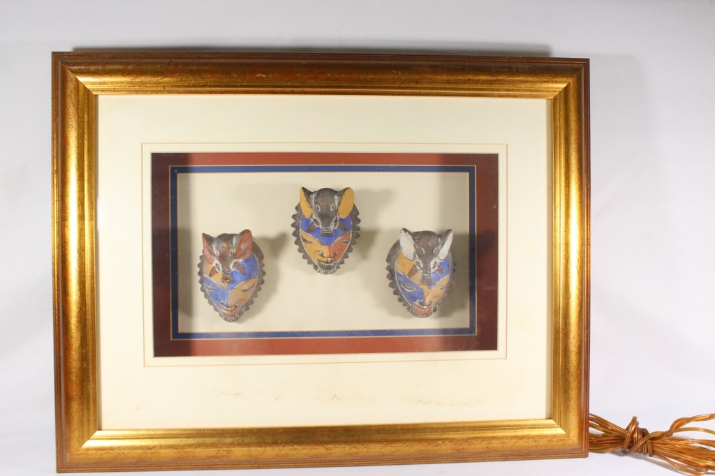 Shadowbox of 3 African Wood Masks: has lights - does not work and needs new plug; interior of glass needs cleaning