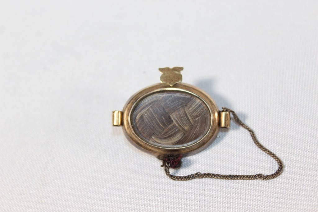 1858 Engraved Locket with Hair: Good overall as pictured