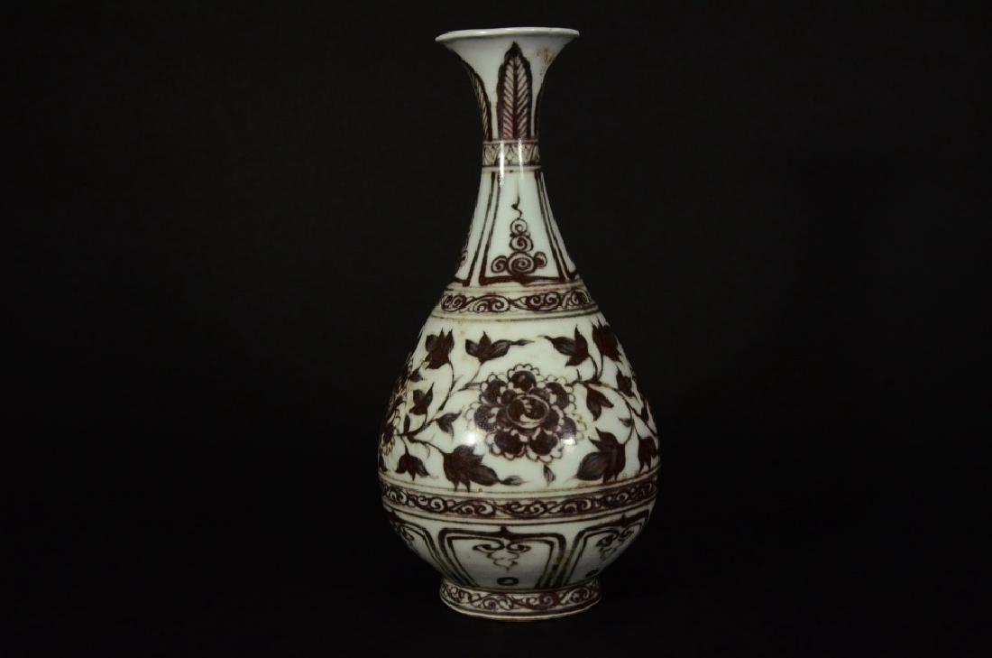 A COPPER RED SCROLLING LOTUS VASE (1 of 6)