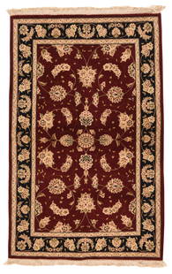 Tabriz Rug, 3'9" x 5'9": The particularly deep and saturated red field show a classic palmette, central rosette, scrolling tendril and rosette raceme pattern, set within nearly black borders with more palmettes and floral