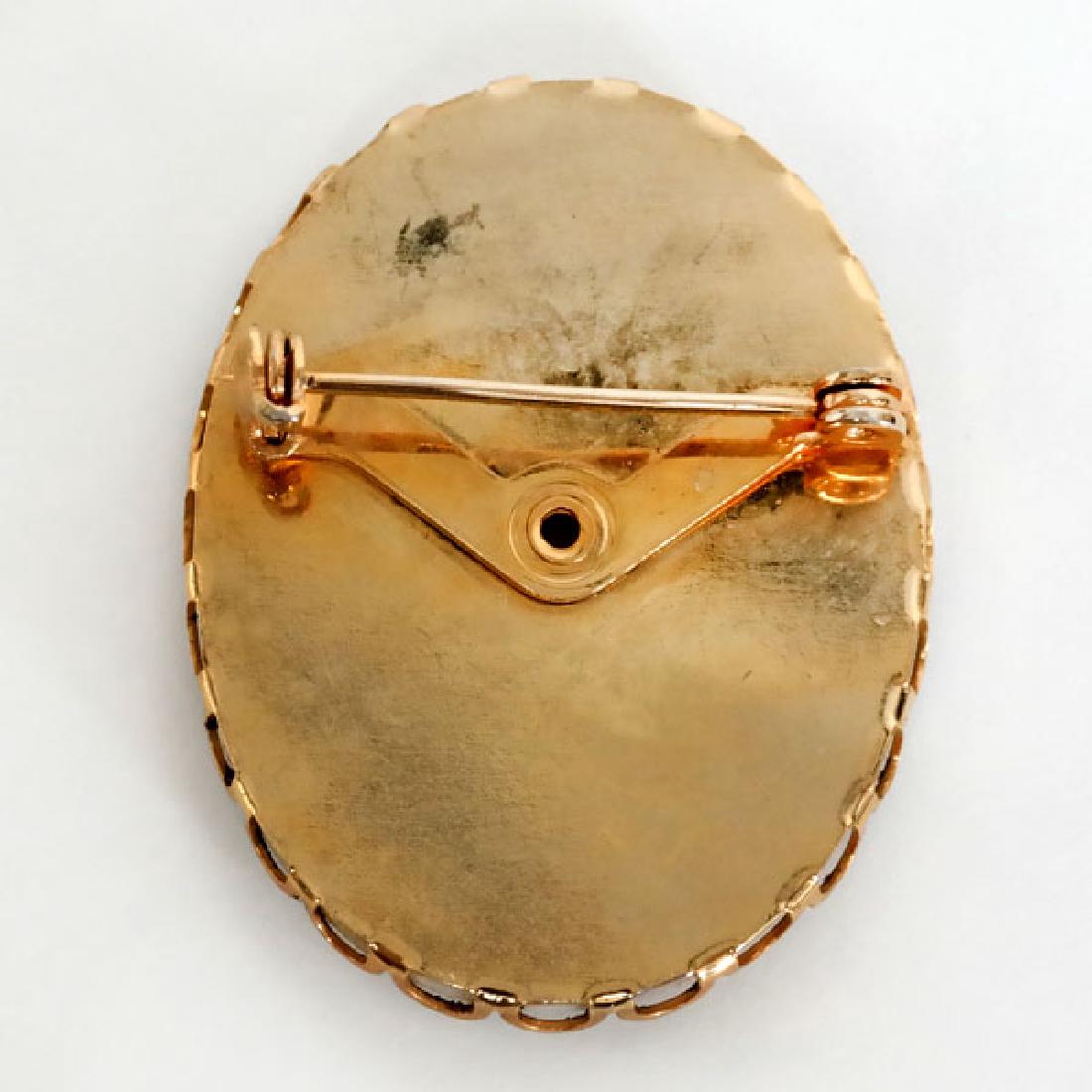 Gold plated oval shape base with picture of CAT on (1 of 1)