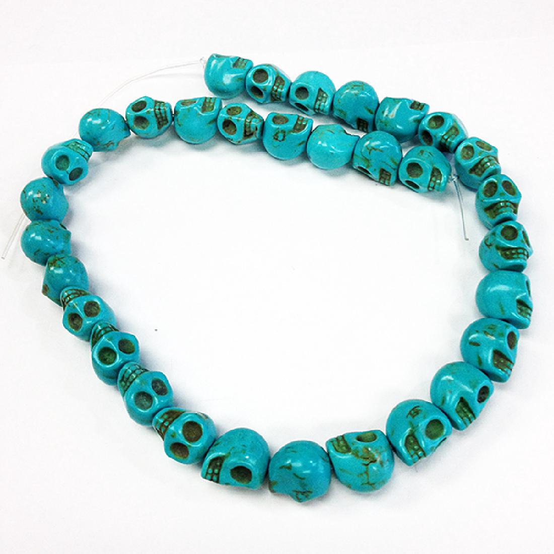 Turquoise colored skull shaped beaded necklace (1 of 1)