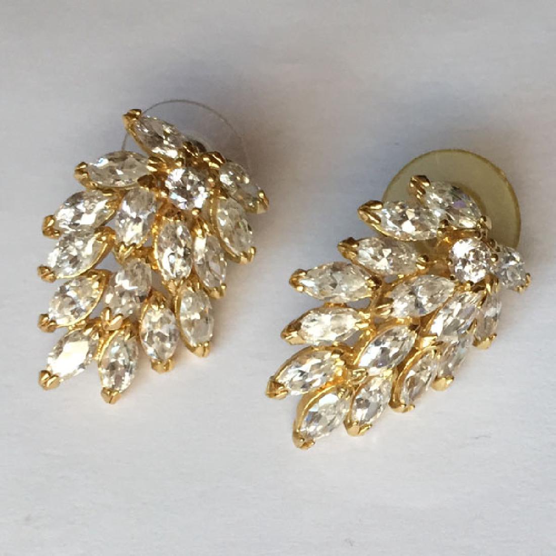 Gold plated earrings with push backs and prongs set: Gold plated earrings with push backs and prongs set rhinestones. Length 1 1/4". High quality workmanship. Condition excellent.