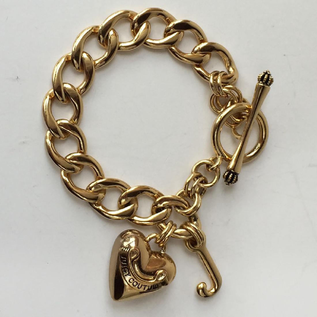 Gold plated Cuban link toggle clasp bracelet with puffy (1 of 3)