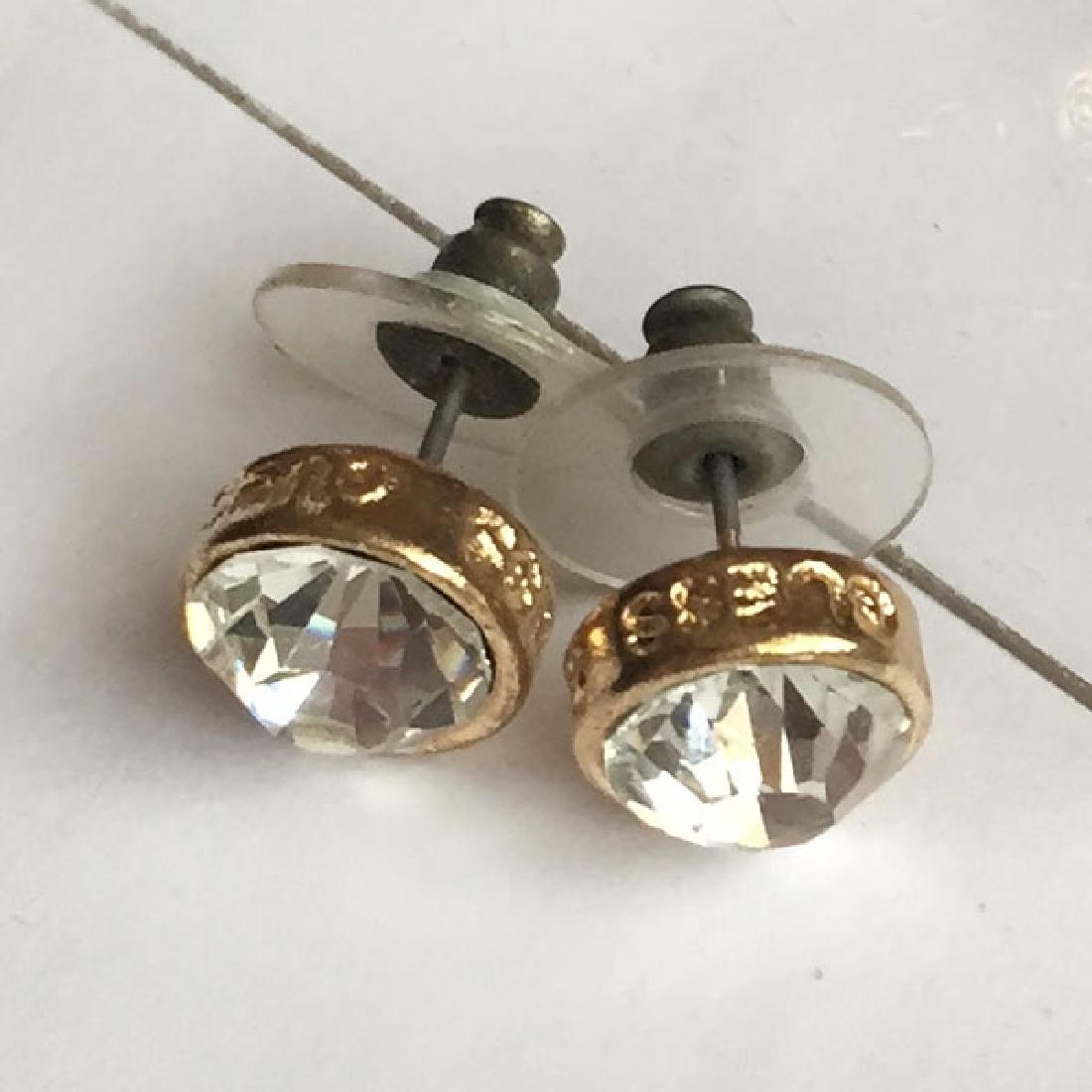Gold tone push back GUESS stud earrings with bezel set (1 of 3)