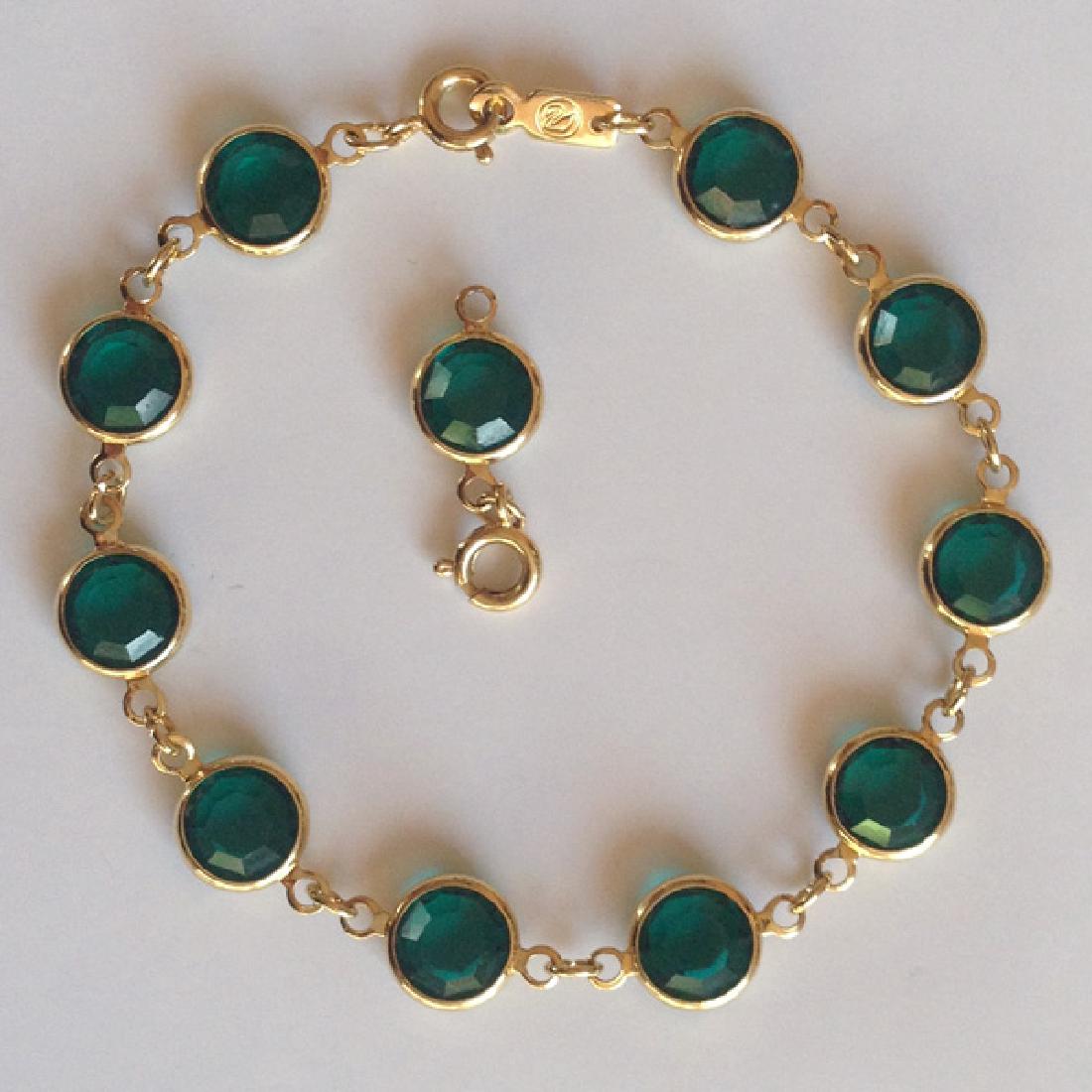 Gold plated SWAROVSKI bezel set round faceted emerald (1 of 3)