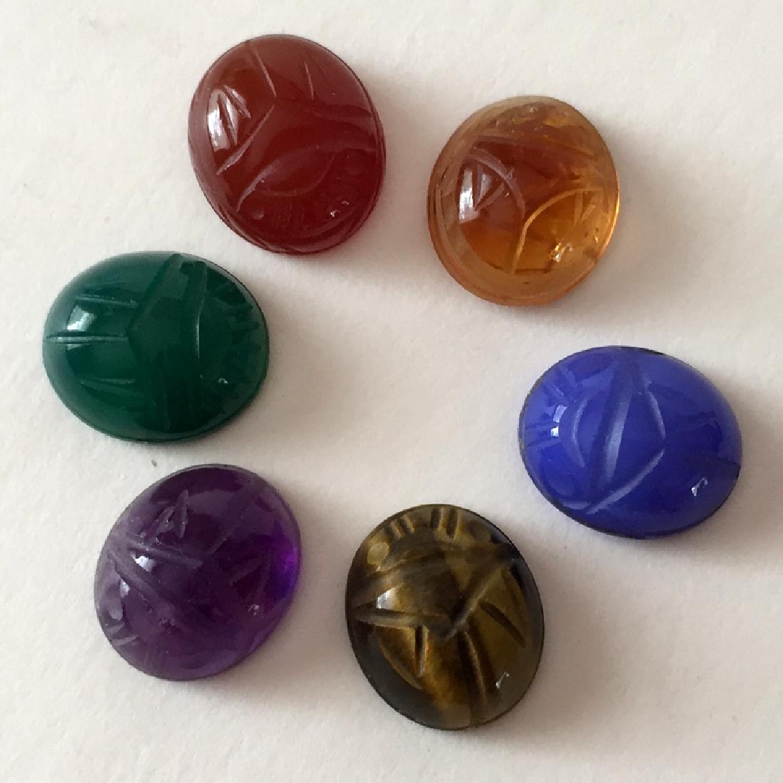 Lot of 6 carved genuine stone oval cabochons (1 of 5)