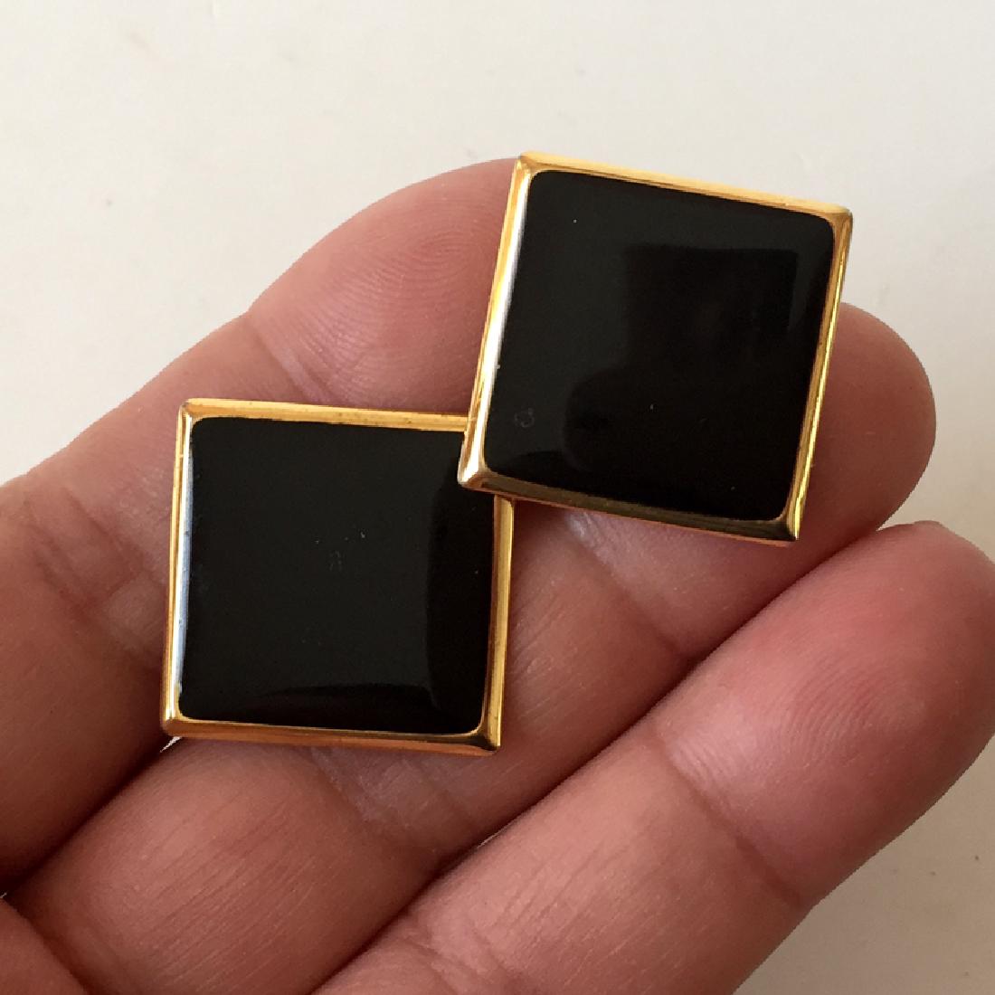 NAPIER: Vintage gold plated square ear clips with black: NAPIER: Vintage gold plated square ear clips with black enamel, signed. Measured 7/8" x 7/8". Condition very good.