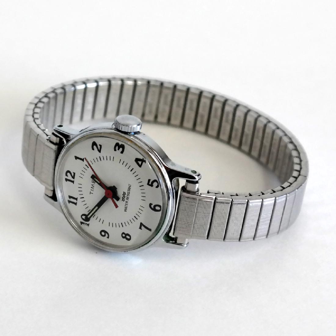 Vintage silver tone round TIMEX Water resistant watch (1 of 4)