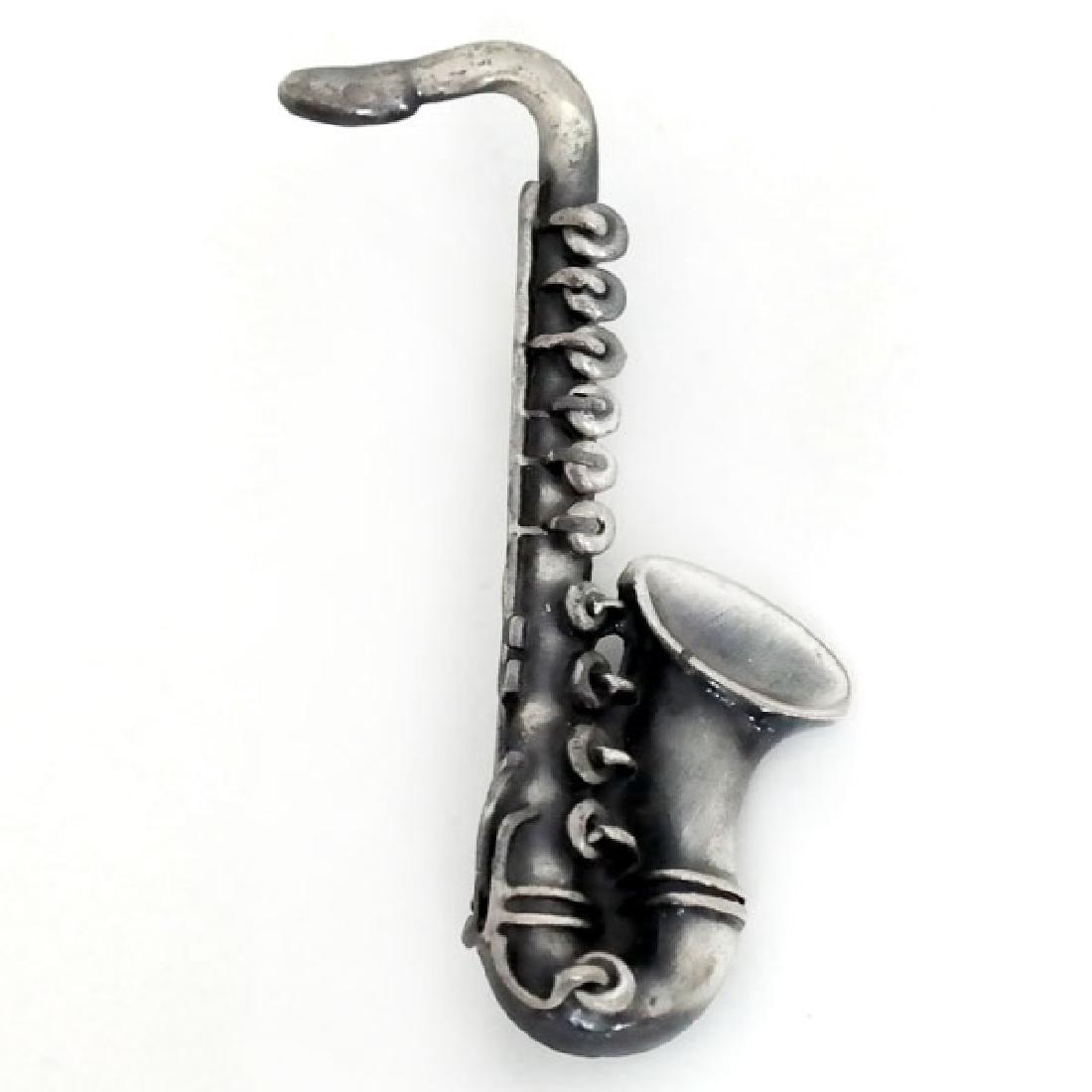 Silver tone satin finish SAXOPHONE shaped brooch (1 of 2)