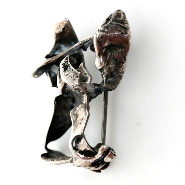 Sterling silver hand made antique finish ABSTRACT: Sterling silver hand made antique finish ABSTRACT brooch. Weight 6.2 grams. Length 1 1/4". Condition very good.