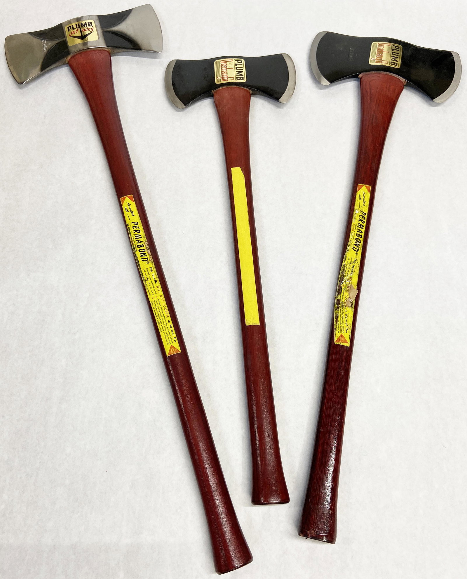 Lot of 3 Vintage Plumb Axes, Never Used.: In Outstanding Condition, given their age. A Jetwing (35 1/2"), A Dreadnaught (31"), and another Dreadnaught (28"). A rare find.
