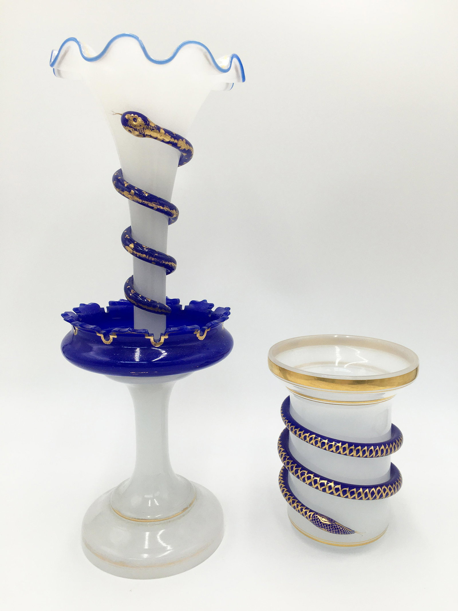 Lot of 2 Opaline Glass Vases w/ Snakes.: The shorter vase has a small break on the tail. Manner of Baccarat. Larger vase is 17" tall, shorter one is 7" tall. Third-Party Shipping Required.