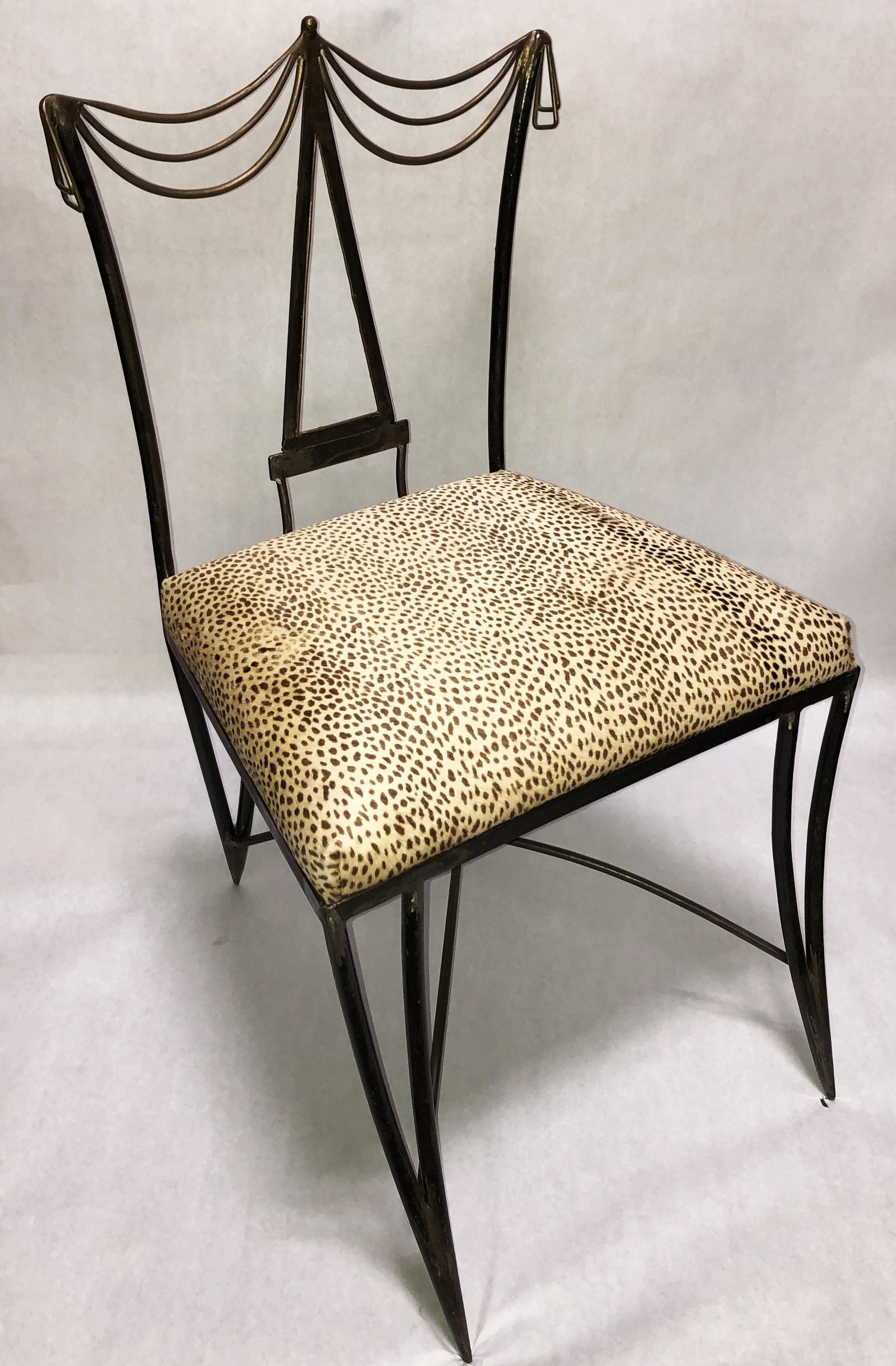 Mario VIlla Side Chair w/ Sling & Triangle Back.: Metal frame, cheetah-dyed cowhide upholstery. Third-Party Shipping Required.