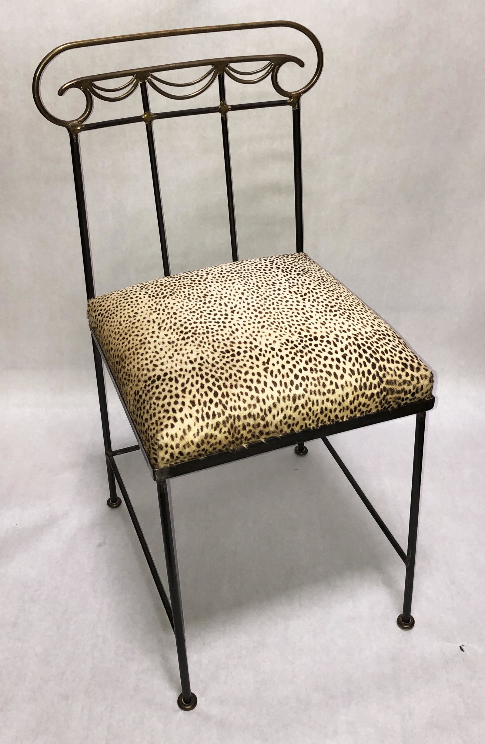 Mario Villa Side Chair w/ Sling and Bar Back.: Metal frame, cheetah-dyed cowhide upholstery. Third-Party Shipping Required.