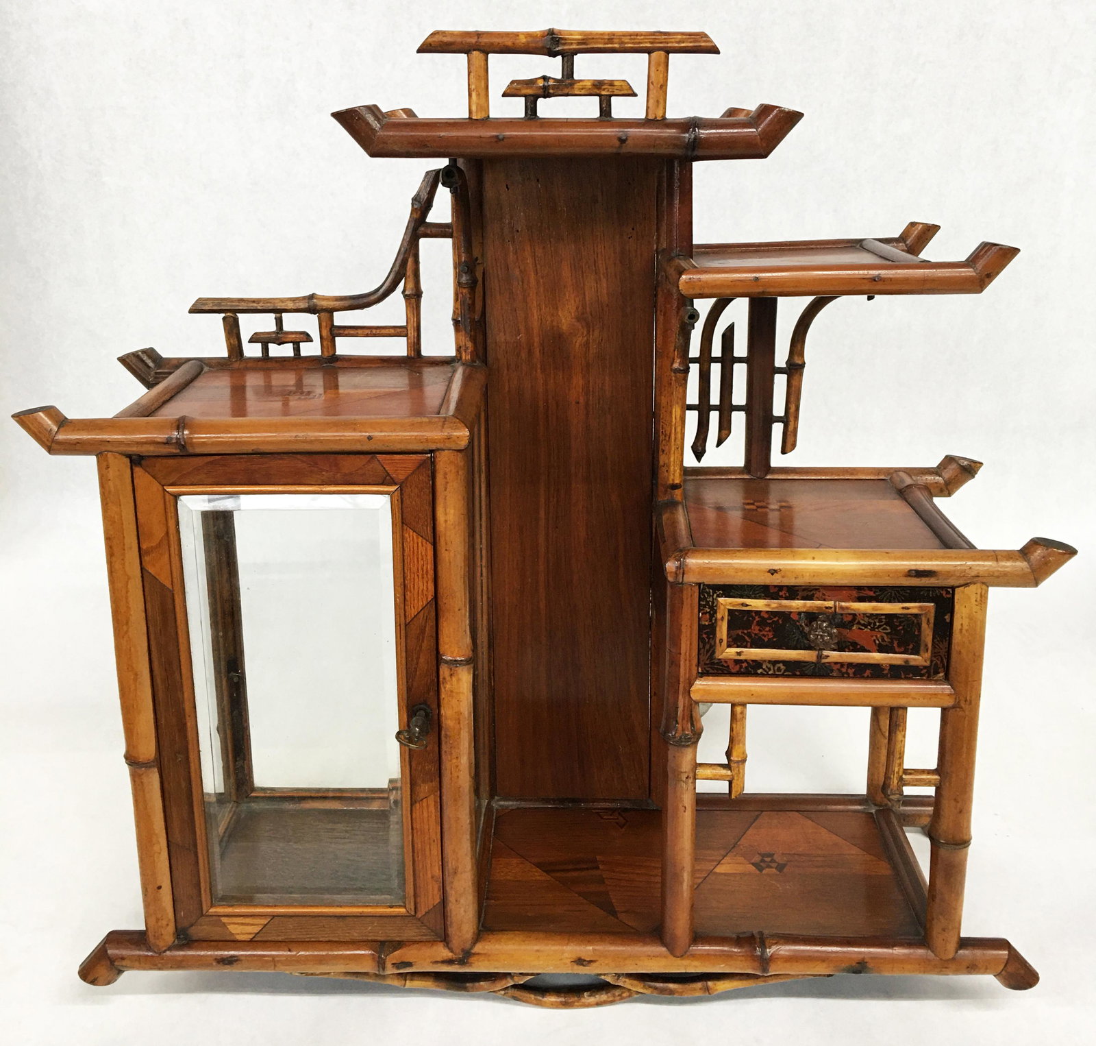 Dai Nippon French Oriental Wall Shelf / Vitrine.: Bamboo Style. With an Old Plate on the Back that Reads "Dai-Nippon, Fabricant a Paris", with the Address. Measures 25" Tall by 26" Wide by 8" Deep. Third-Party Shipping Required.