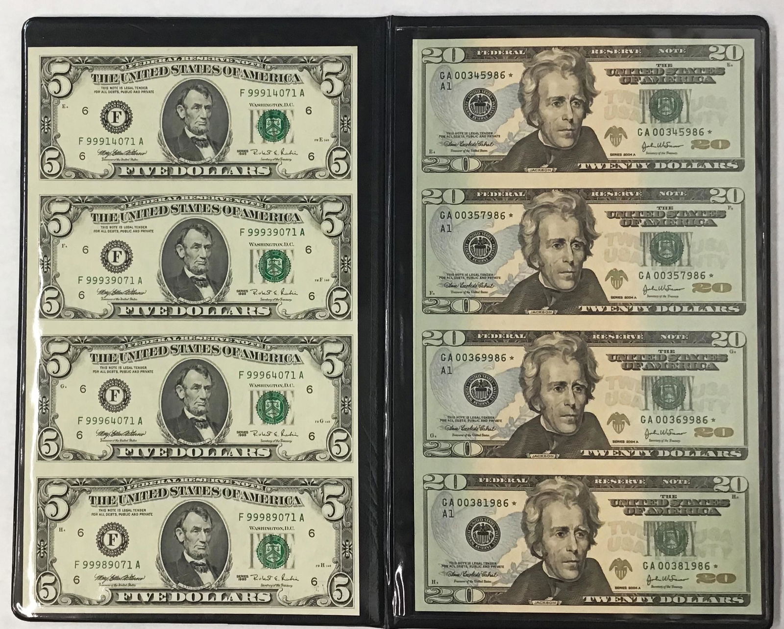 Lot: Uncut $20 & $5 Note Sheets & Currency Book.: An Uncut Sheet of Four Series 2004A GA $20 Star Notes, and an Uncut Sheet of Four 1995 $5 Notes, as Well as a Leather World Reserve Monetary Exchange Book.