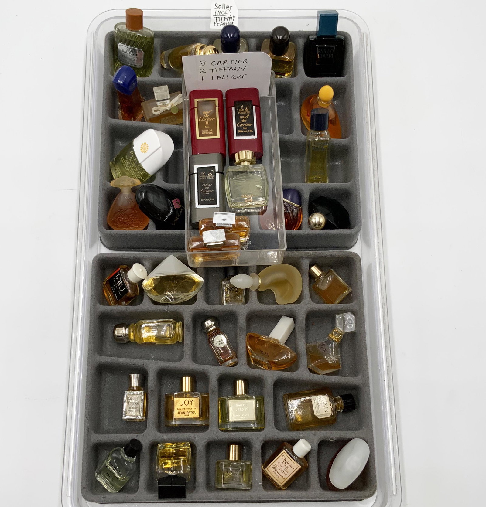 Large Lot of Miniature Sample Perfumes.: Includes: 3 Cartier, 2 Tiffany, and one Lalique. Third-Party Shipping Required.