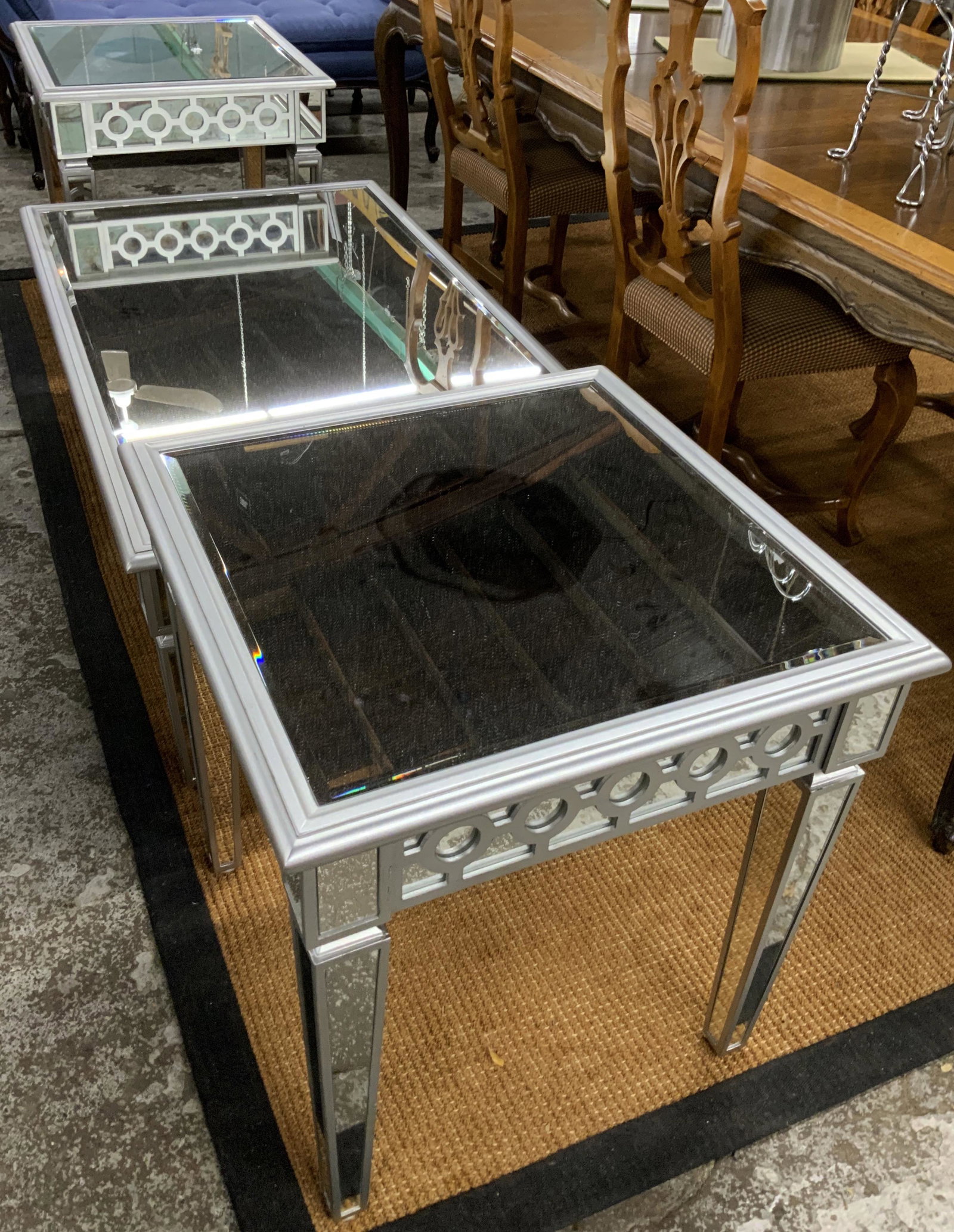 Set of 3 Contemporary Bevelled Mirrored Tables.: A 50" Wide Coffee Table and a Pair of 24" Square Lamp Tables. In Very Good, but not Perfect Condition. Third-Party Freight Shipping or Personal Pickup Required.