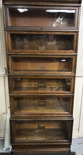 6-Stack Antique Oak Barrister Bookcase.: By the Globe-Wernicke Company. With Top and Base. In Excellent Condition. Unit Measures 34" Wide and 80" High. Third-Party Freight Shipping or Personal Pickup Required.