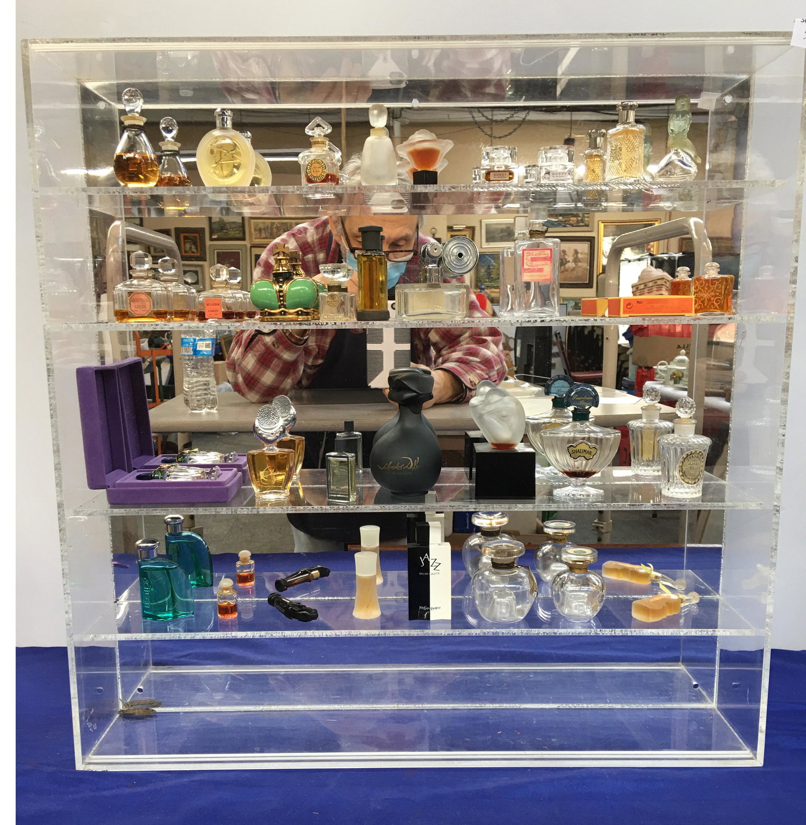 Case of Vintage Perfumes and Perfume Bottles.: Salvador Dali, Guerlain, Shalimar, etc. Many of these are Quite Small. The Lucite Display Case is Included. Third-Party Shipping Required.